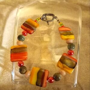 Handmade  natural shell  multi colored  7and half bracelet